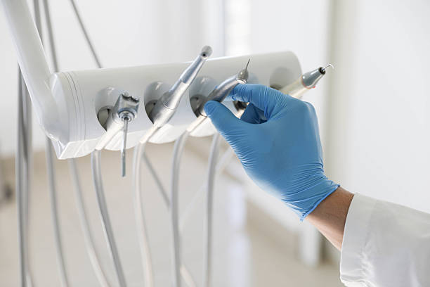 Professional Emergency Dentist technician working in Pecan Acres, TX